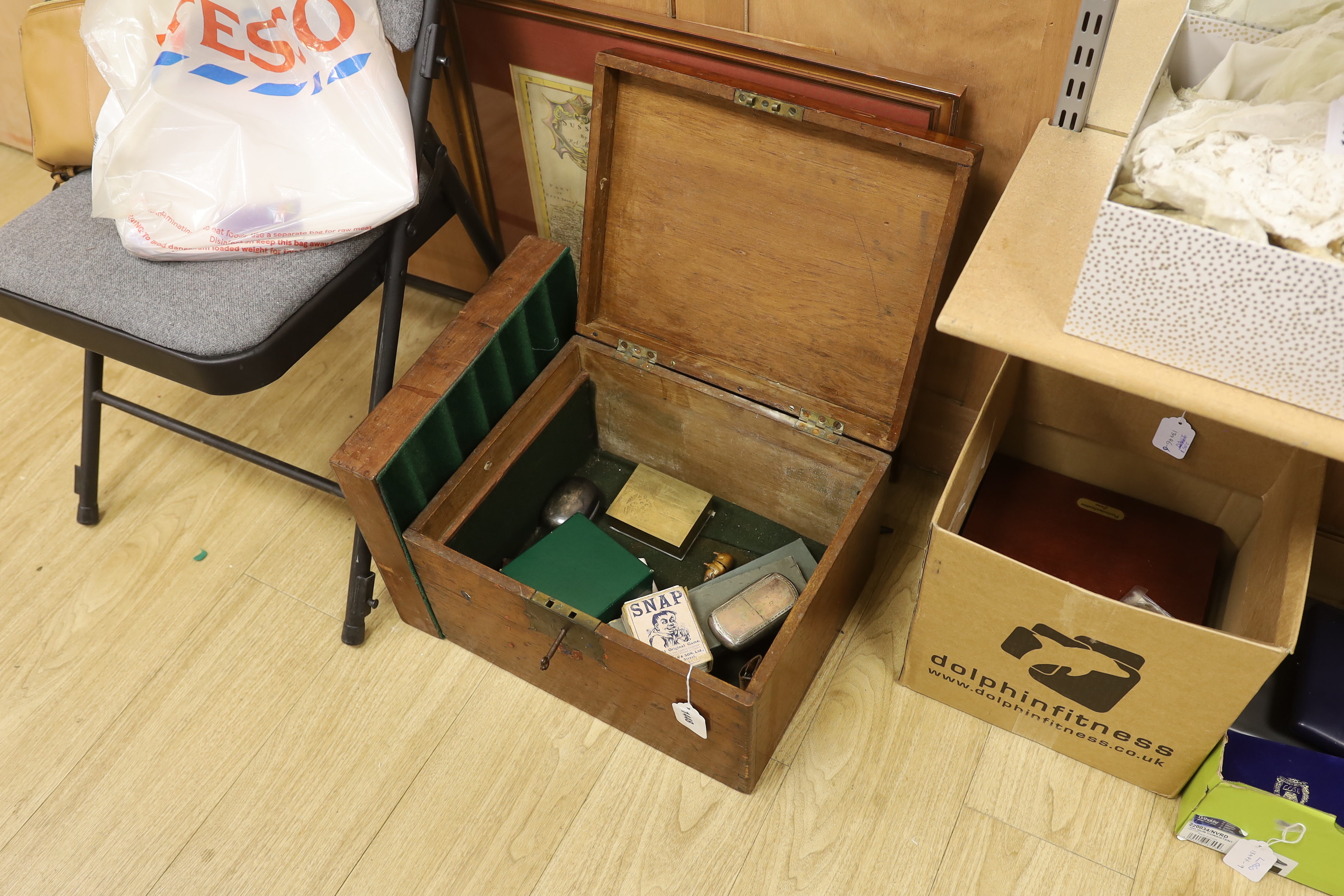 A mahogany strong box containing a small quantity of miscellaneous items, including snuff boxes